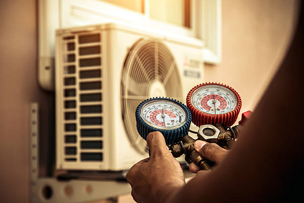 Professional Hvac technician working in Plain City, UT